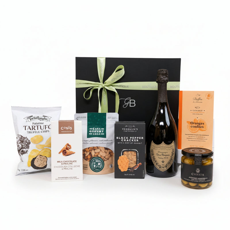 Dom Pérignon Vintage 2015 luxury gift box with truffle chips, praline cookies, roasted nuts, and dark chocolate in a signature gift box