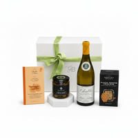 Wine bottle with a gift box, olives and  snacks on a white gift box